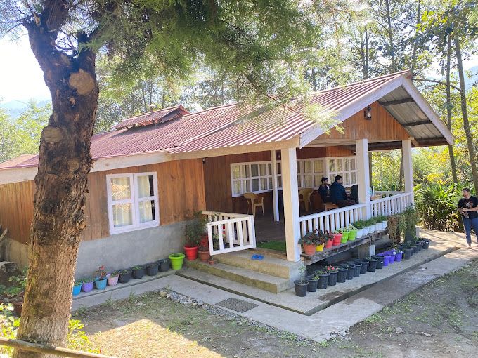 A scenic view of a Government Tourist Lodge in Arunachal Pradesh.