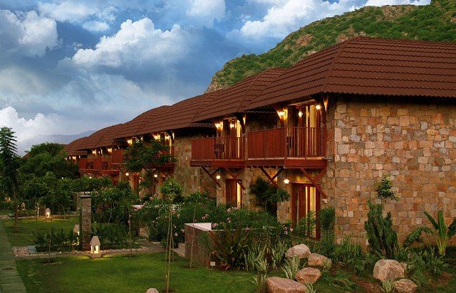 A comfortable hotel in Itanagar with a view of the city and hills.